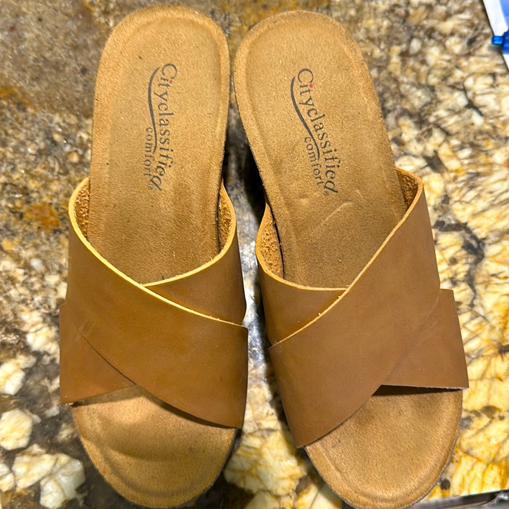 Tan wedge heeled slip-on women’s shoes